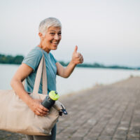 Senior Woman Finishing Exercise