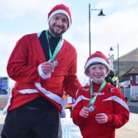 Mark Bousfield With Son Hugo At Santas On The Bay 2021 9