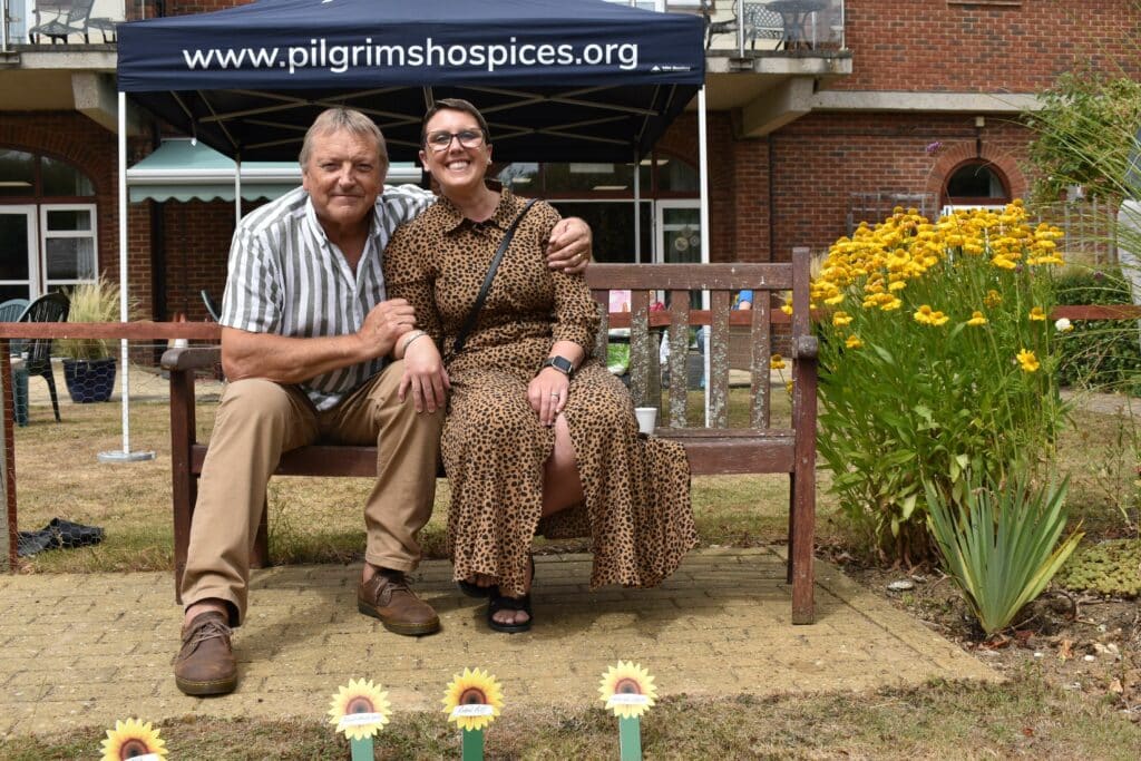 David Oliver Sunflowers Small David and his niece, Katie, remembering his wife, Sue, at Sunflower Memories 2023